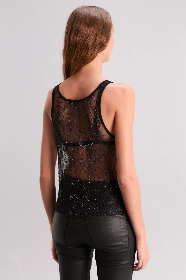 Musculosa de encaje negro con detalles brillantes para un look elegante y sofisticado de Kosiuko en Tops para argentina