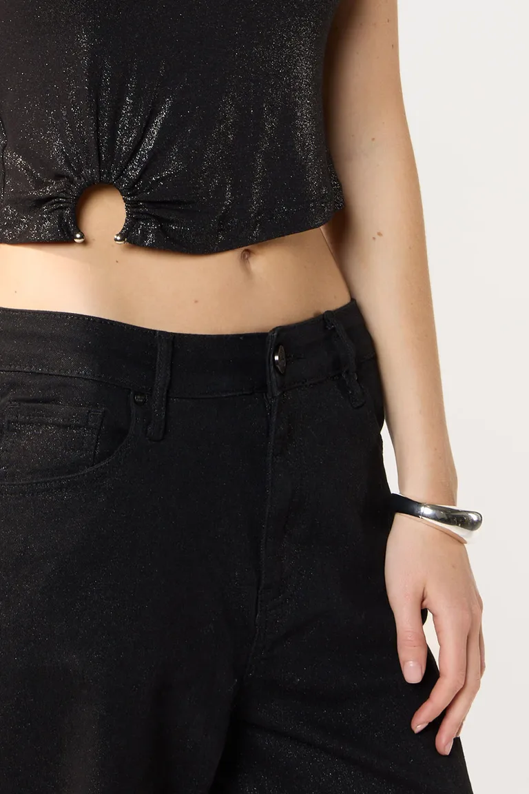 Musculosa de jersey negro, un básico sofisticado y de fácil combinación de Cuesta Blanca en Tops para argentina