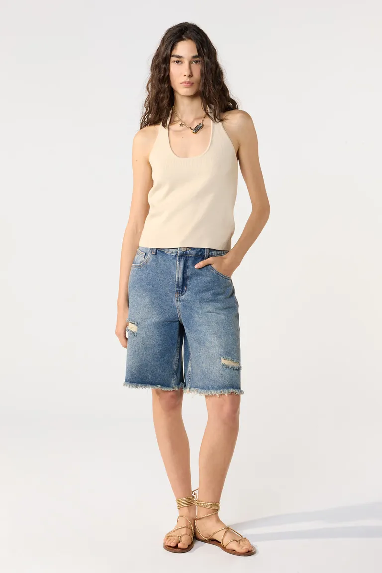 Pantalones cortos de denim con detalles desflecados para un estilo casual y fresco de Cuesta Blanca en Shorts para argentina