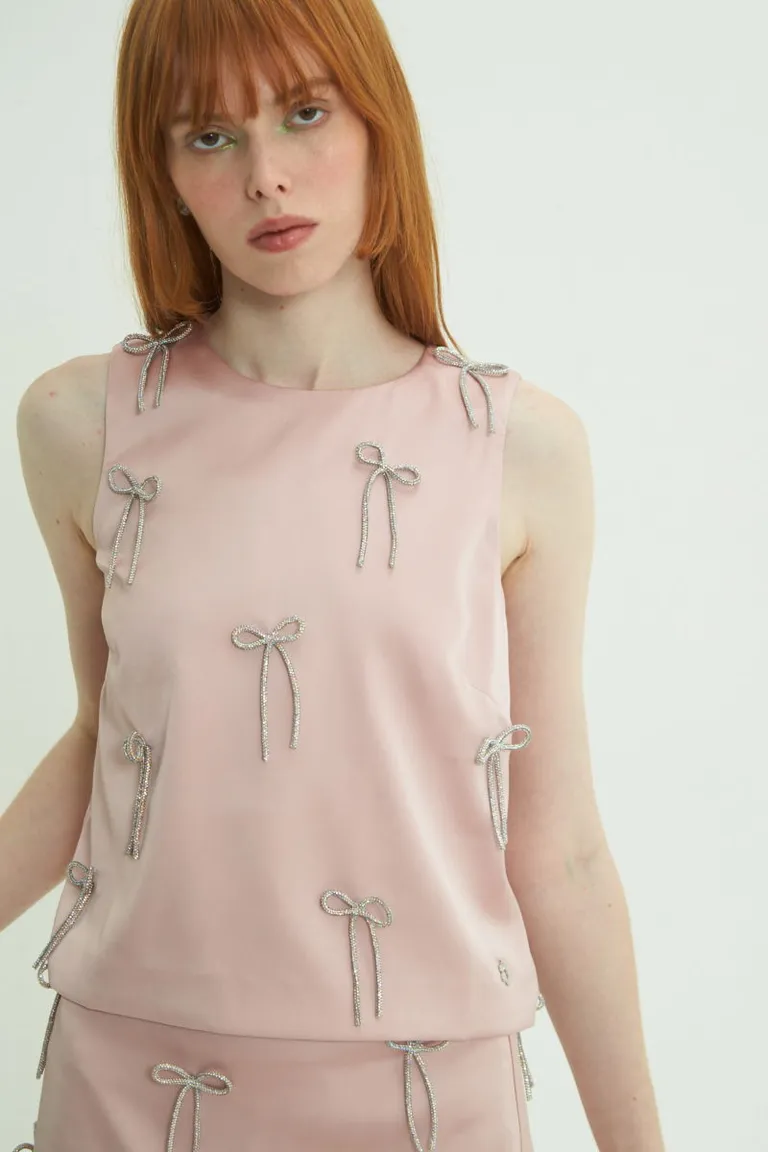 Top satinado rosa sin mangas con moños en el frente y espalda de Las Pepas en Tops para argentina