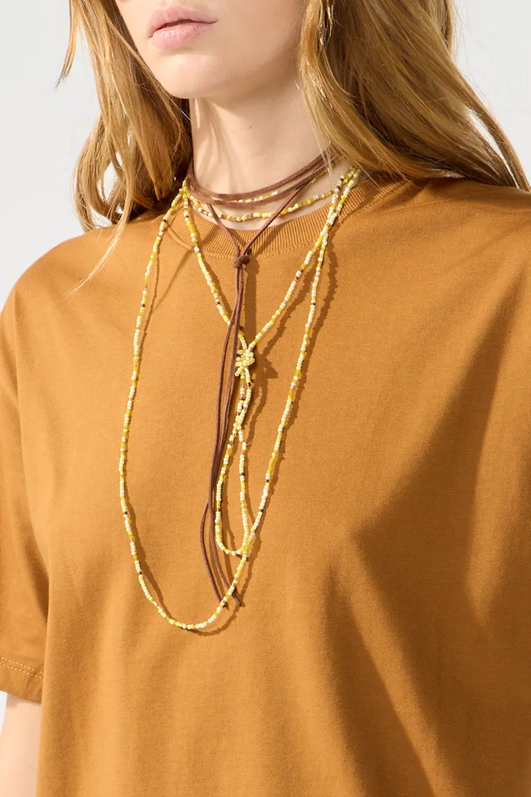 Remera de algodón de manga corta en tono naranja para mujer de Cuesta Blanca en Remeras para argentina