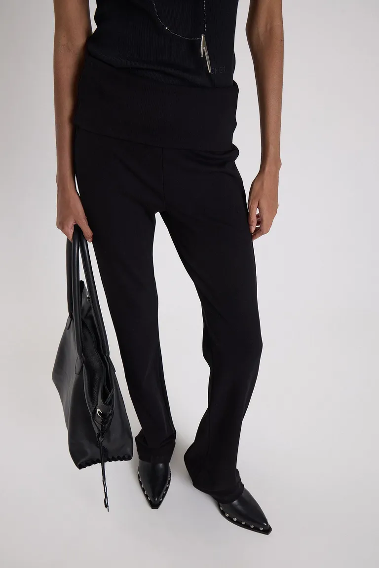 Pantalón de corte flare con diseño de cintura destacada y botamanga ancha de Maria Cher en Pantalones para argentina