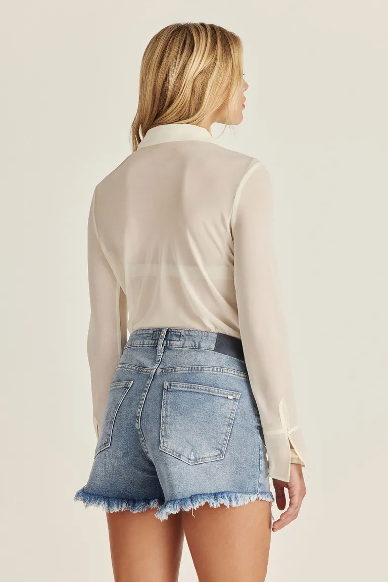 Shorts de mezclilla cortos con lavado vintage y acabado desflecado de Tucci en Shorts para argentina