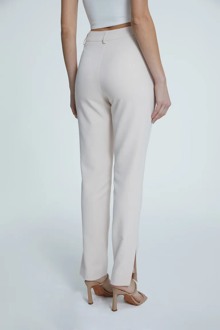 Pantalón de crepe satinado con cintura alta y bolsillos laterales de Naíma en Pantalones para argentina