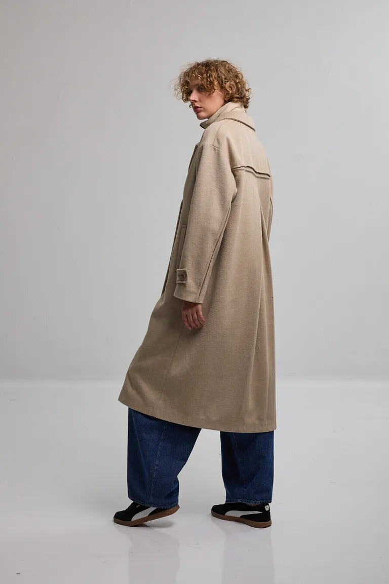 Tapado largo con frente desmontable y bolsillos laterales de diseño entallado de Kill en Tapados para argentina