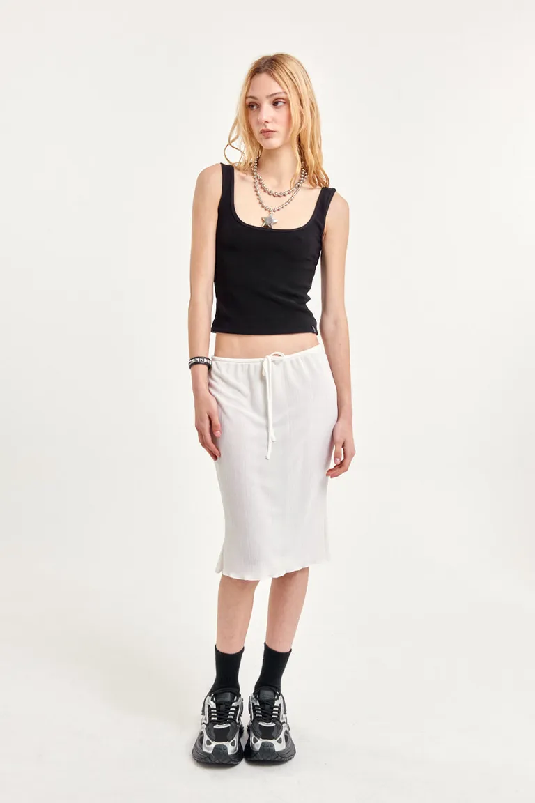 Falda corta de ribb fantasía translúcido con cintura elastizada de 47 Street en Faldas para argentina