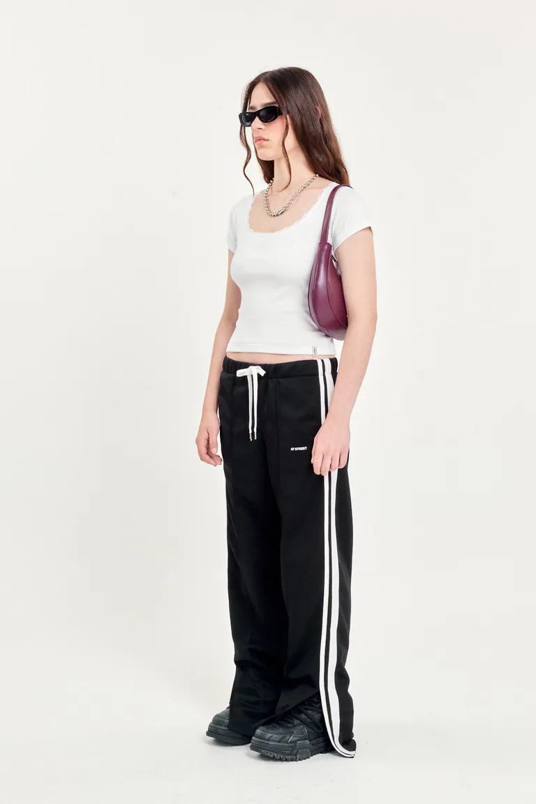 Pantalón recto deportivo de cintura elástica con detalles en los laterales y ruedo con tajo de 47 Street en Pantalones para argentina