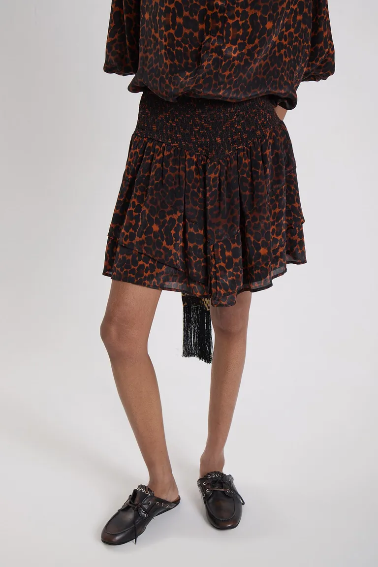 Falda corta con cintura elastizada y diseño fluido con vuelo de Maria Cher en Faldas para argentina