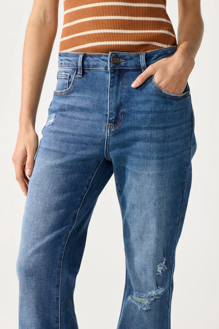 Pantalones de mezclilla de corte flare con efecto desgastado y roturas de Cuesta Blanca en Pantalones para argentina