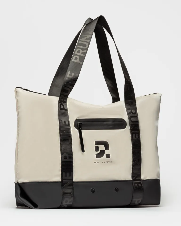 Bolso shopper de lona y piel en diseño minimalista y tonos contrastantes de Prüne en Bolsos y Carteras para argentina