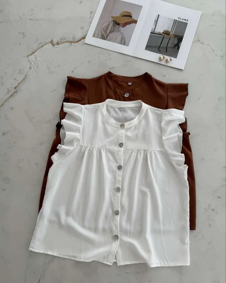 Camisa blanca de rayon poplin sin mangas con volados y fruncidos de Hesed en Camisas para argentina