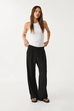 Pantalón fluido de lino de Stradivarius en Pantalones para argentina