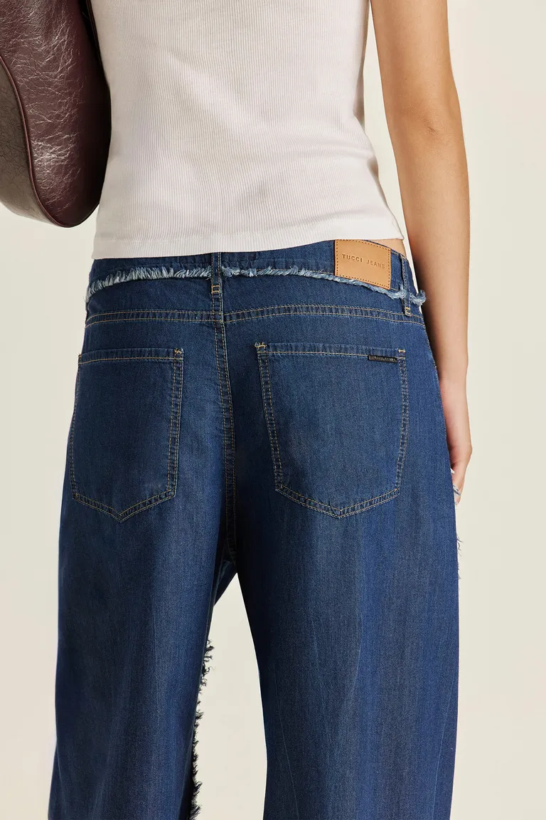 Pantalón de corte wide leg con efecto desgastado en tono azul de Tucci en Pantalones para argentina