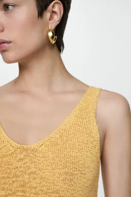 Top punto escote pico de Mango en Tops para argentina