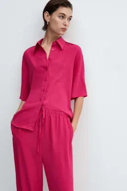 Pantalón wideleg cintura elástica de Mango en Pantalones para argentina