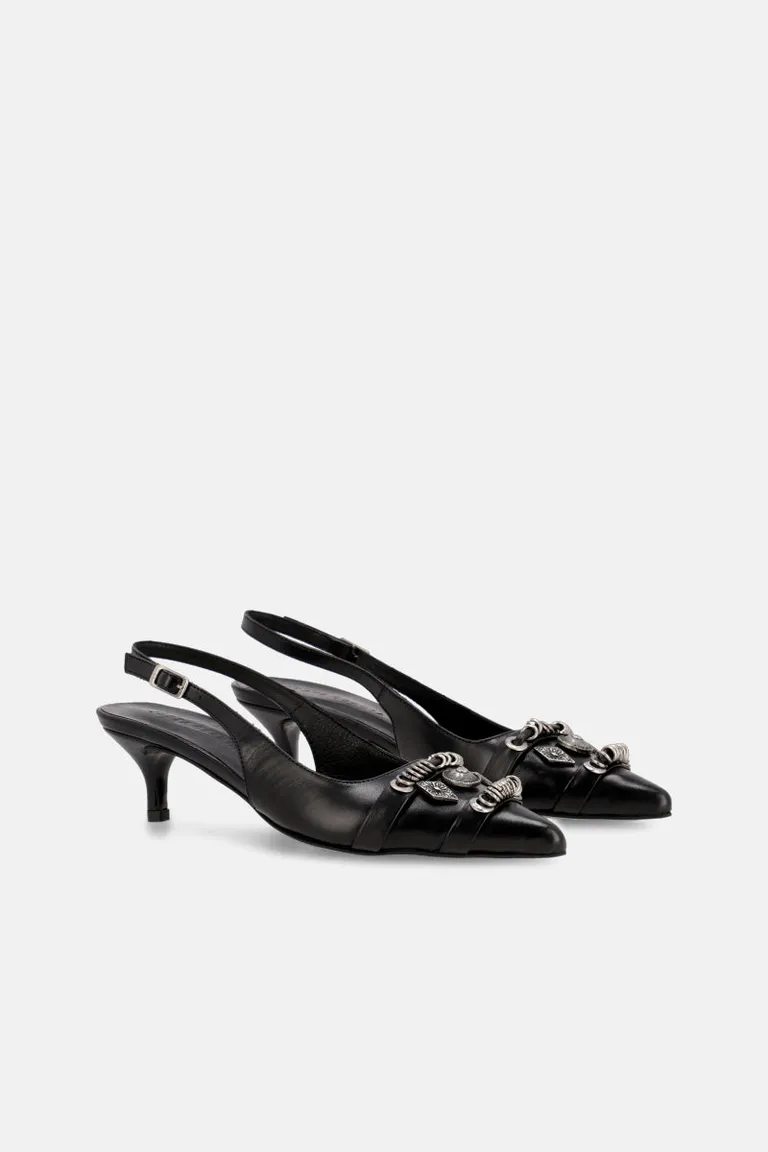 Zueco elegante con apliques en níquel y tacón medio para mujer de Justaosadia en Zuecos Planos para argentina