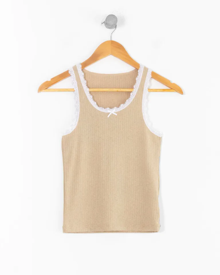 Top con encaje y moño en el frente en tela calada de estilo femenino de Sky en Tops para argentina