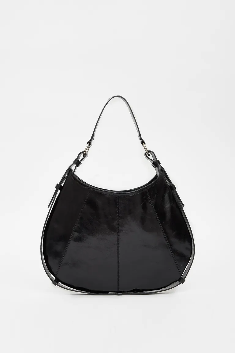Cartera de cuero negra con detalles recortados y correa ajustable de Ay Not Dead en Bolsos y Carteras para argentina