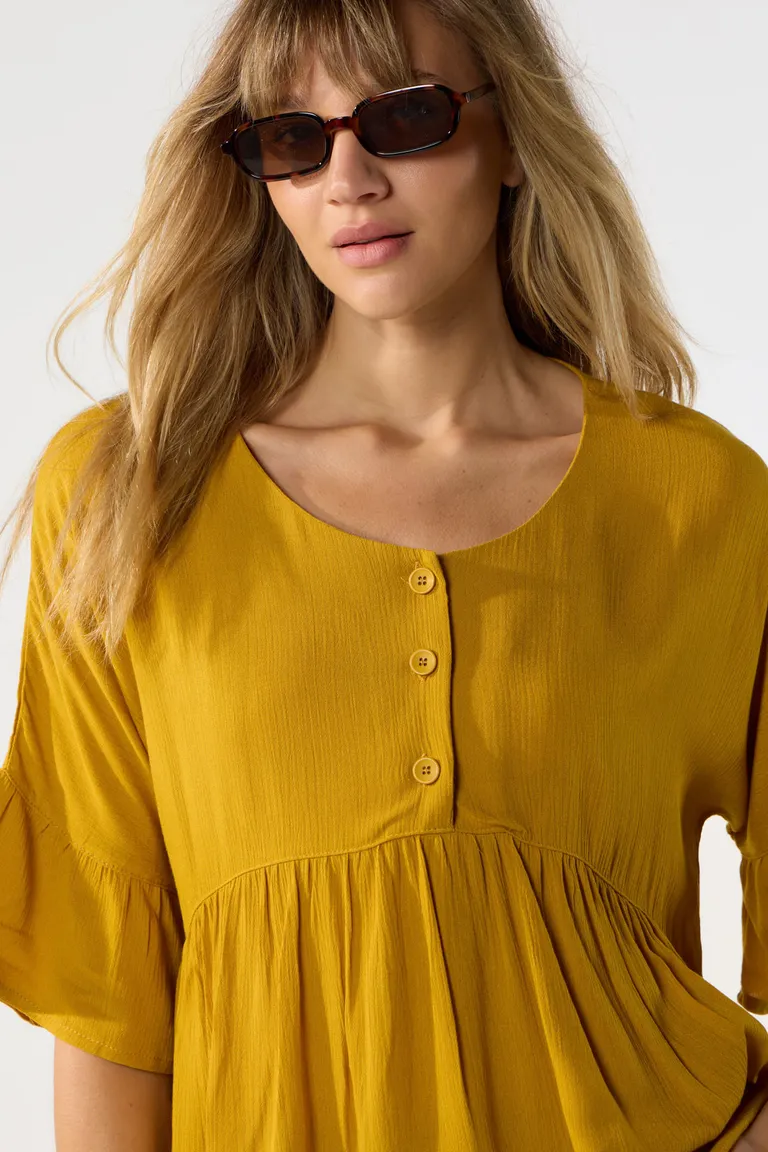 Blusa de bambula con recorte en cintura y mangas de Cuesta Blanca en Blusas para argentina