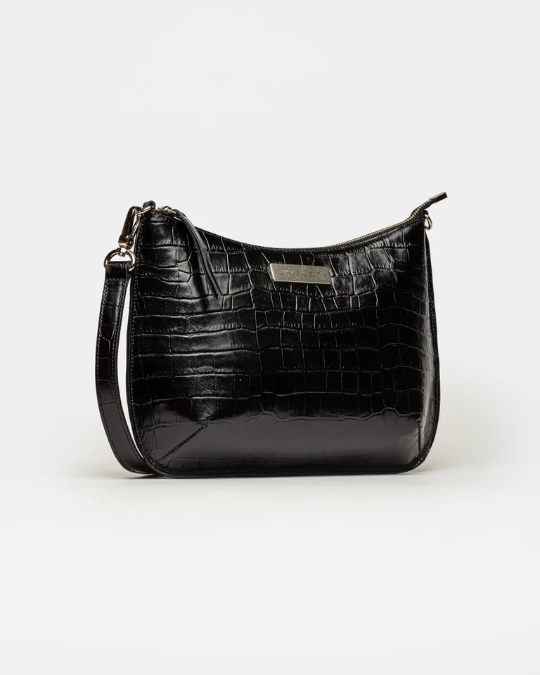 Bolso bandolera de cuero genuino con detalles en metal - Diseño refinado y funcional de Prüne en Bolsos y Carteras para argentina