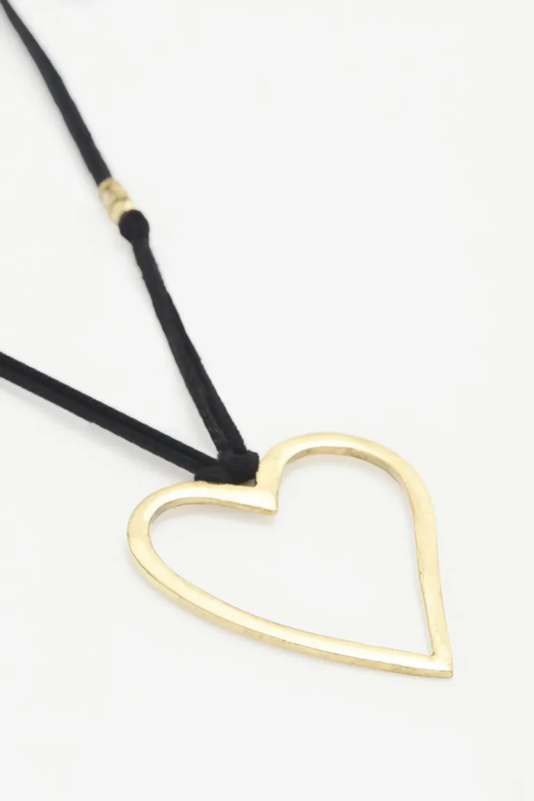Collar ajustable con dije corazón metálico diseño minimalista de Rapsodia en Bijouterie para argentina