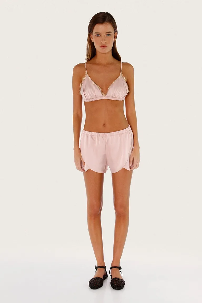 Conjunto de dos piezas rosa en satén con diseño irregular y cintura elástica de Sofia Sarkany en Swimwear y Beachwear para argentina