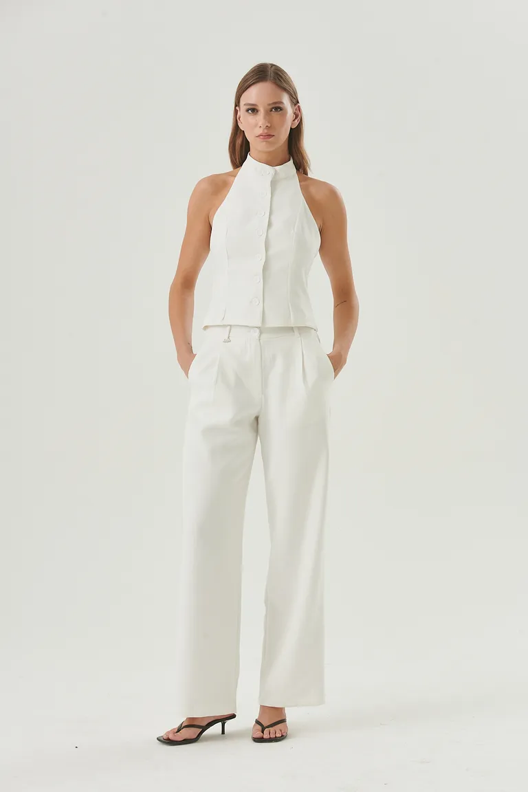 Pantalón blanco de corte amplio y fluido, perfecto para looks formales y casuales de Sweet en Pantalones para argentina