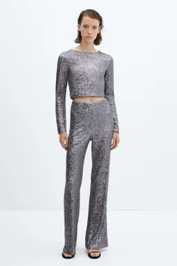 Pantalón flare lentejuelas de Mango en Pantalones para argentina