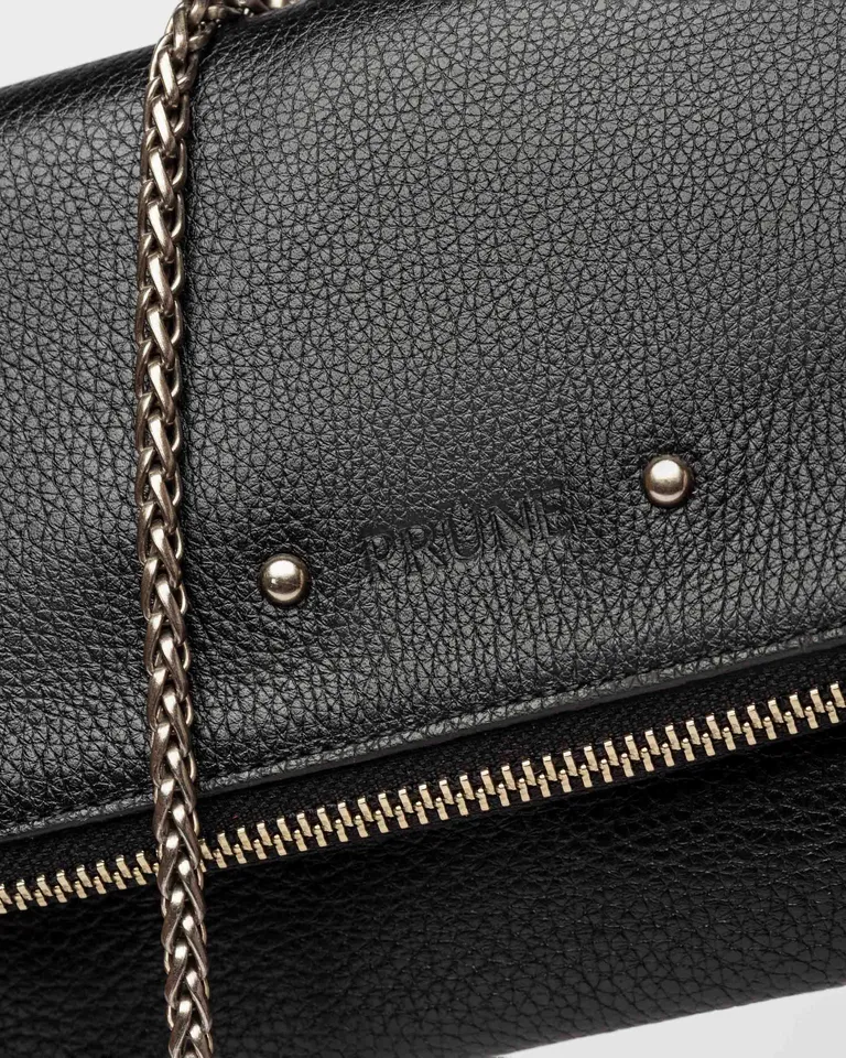Mini bolsa de mano en cuero negro, diseño versátil y elegante de Prüne en Bolsos y Carteras para argentina