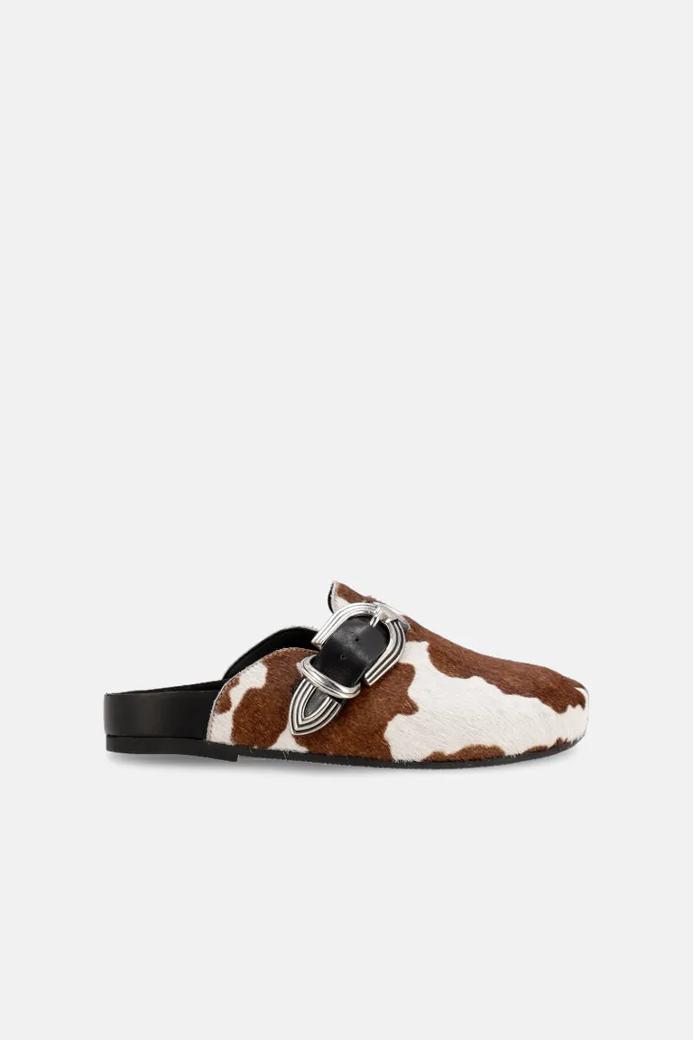 Mule estiloso con estampado animal print vaquero y hebilla metálica de Justaosadia en Zuecos Planos para argentina