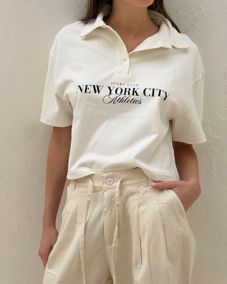 Remera de cuello polo blanca con estampado 'NEW YORK CITY ATHLETES' de Sky en Remeras para argentina