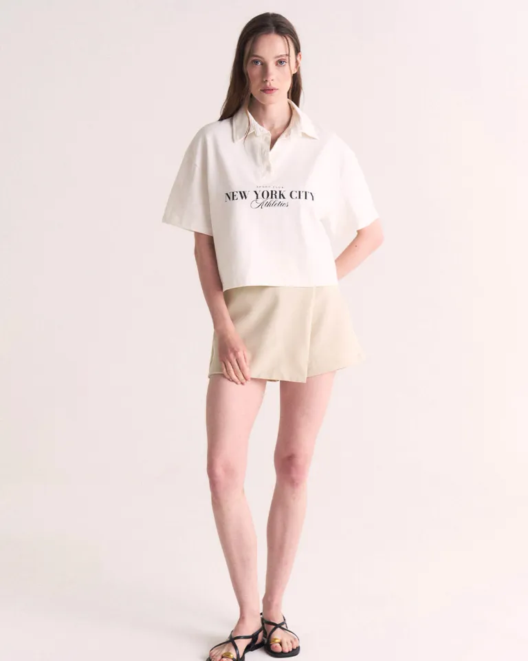 Remera de cuello polo blanca con estampado 'NEW YORK CITY ATHLETES' de Sky en Remeras para argentina