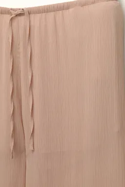 Pantalón fluido semitransparente de Pull&Bear en Pantalones para argentina