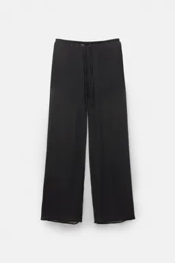 Pantalón fluido semitransparente de Pull&Bear en Pantalones para argentina