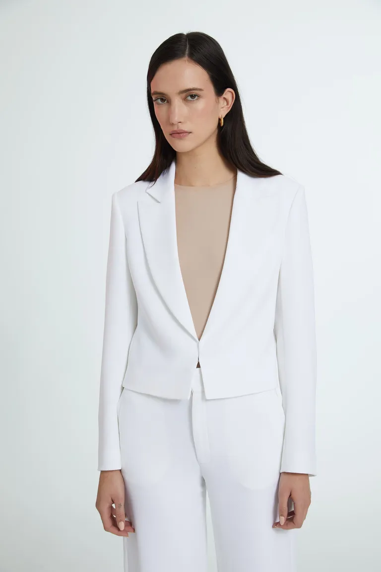 Blazer de corte entallado en crepe blanco, sin solapas y de cierre peletero de Naíma en Blazers para argentina