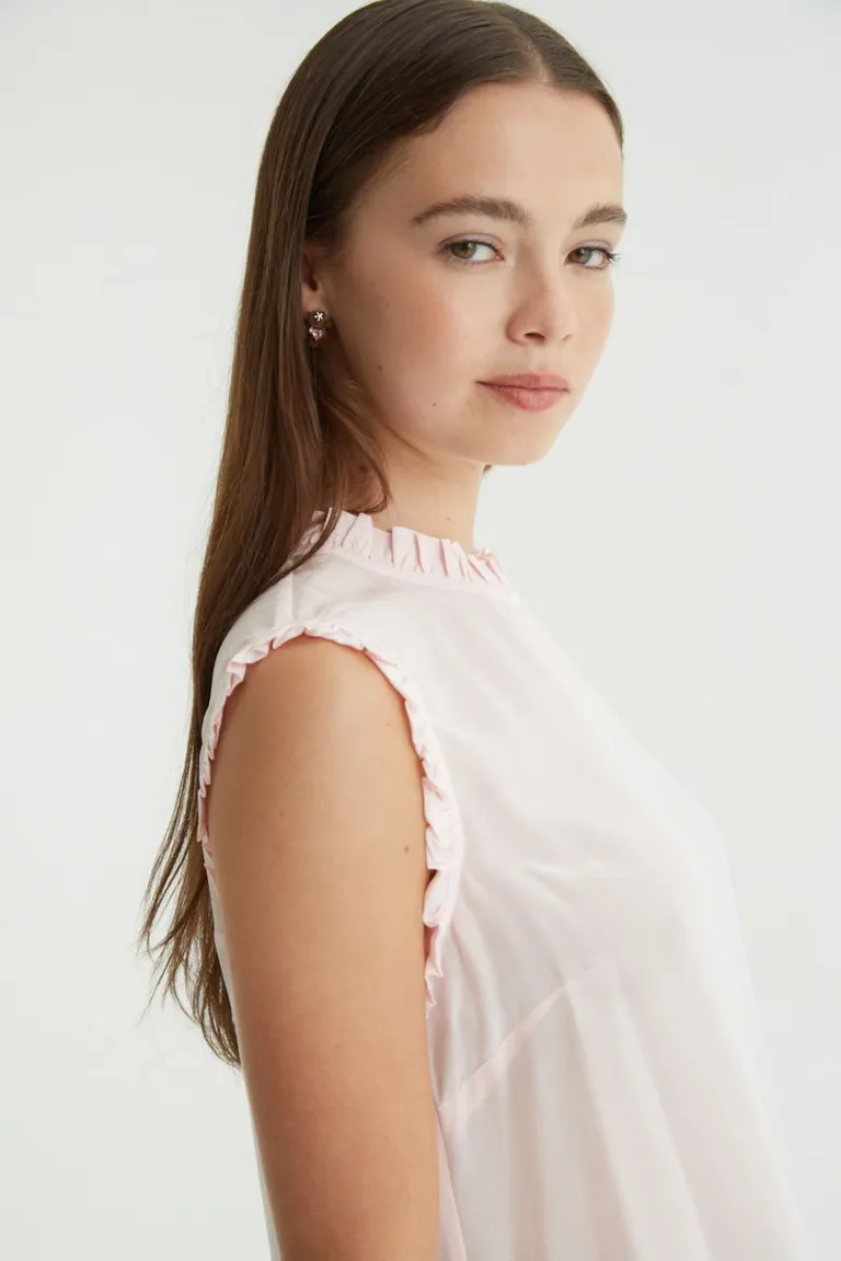 Musculosa sin mangas con cuello redondo y volados delicados en sisas de Las Pepas en Tops para argentina