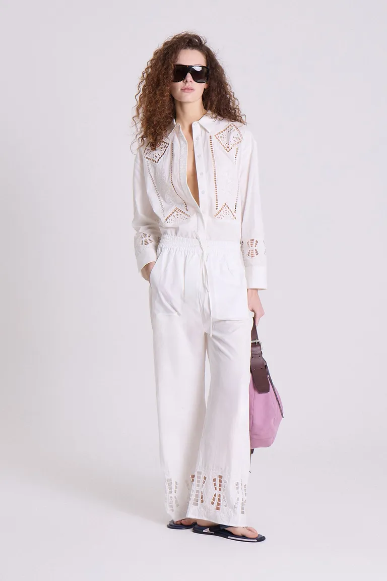 Pantalón ancho de algodón blanco con bordados calados en la botamanga de Maria Cher en Pantalones para argentina