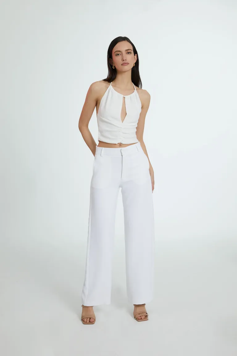 Top halter de diseño minimalista y elegante en color blanco de Naíma en Tops para argentina