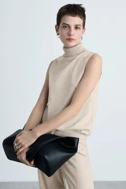 Top punto cuello alto de Mango en Tops para argentina
