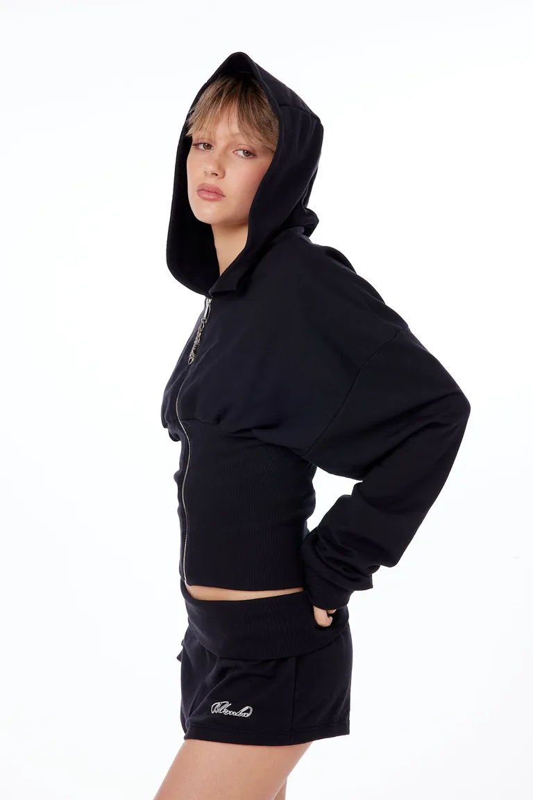 Chaqueta con capucha negra de estilo encorsetado, cremallera frontal y puños de canalé de Black Mamba en Buzos y Sweaters para argentina