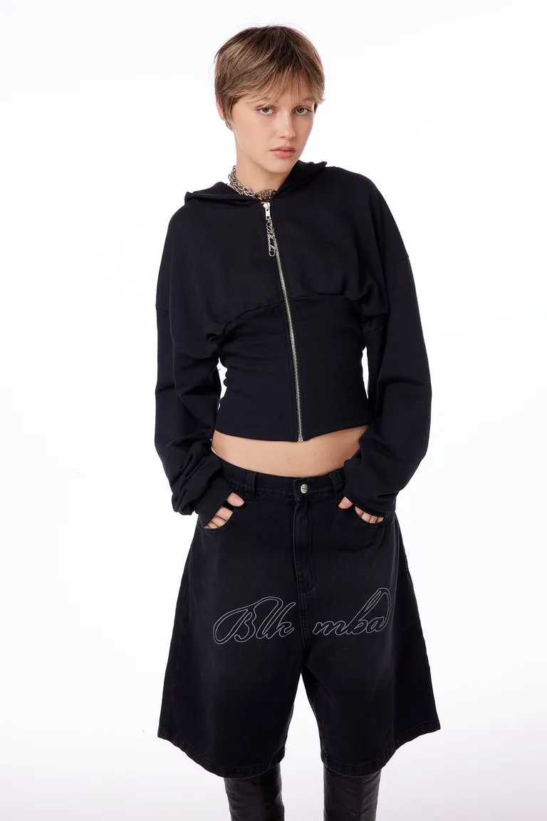 Chaqueta con capucha negra de estilo encorsetado, cremallera frontal y puños de canalé de Black Mamba en Buzos y Sweaters para argentina