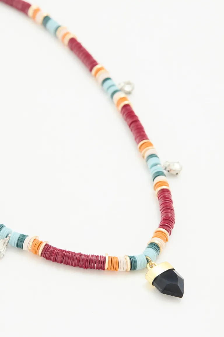 Collar artesanal con cuentas planas, dije en forma de gota y cadena extensible de Rapsodia en Bijouterie para argentina