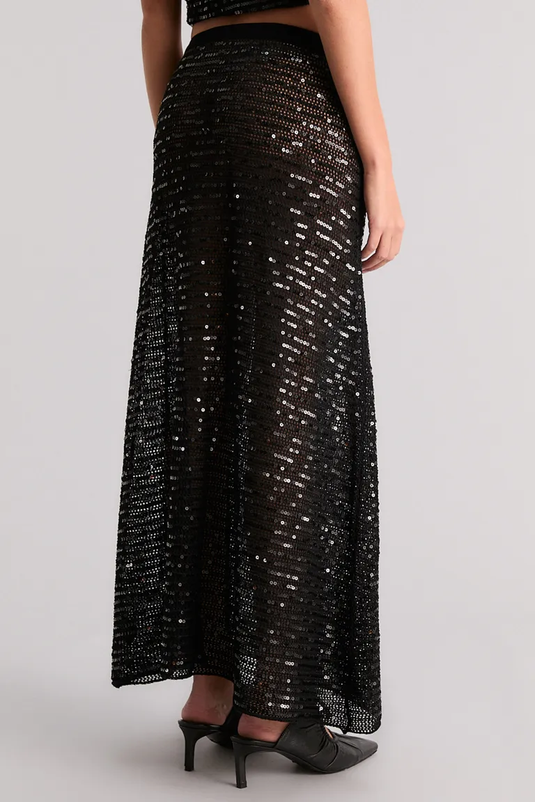Falda midi con detalles de lentejuelas y tiro alto para un look elegante y brillante de Kosiuko en Faldas para argentina