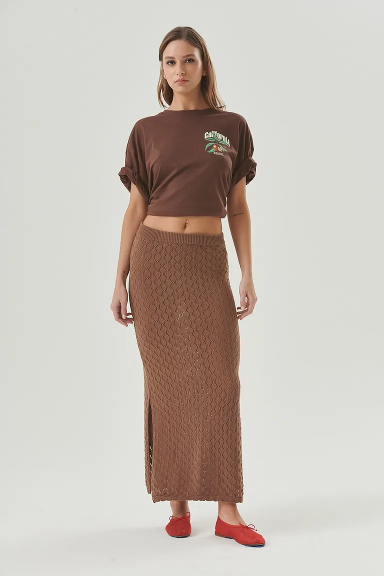 Falda larga de diseño calado en tejido de hilo para un look elegante y moderno de Sweet en Faldas para argentina