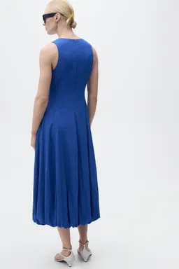 Vestido midi bajo abullonado de Mango en Vestidos para argentina