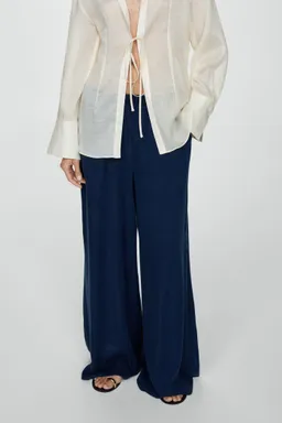Pantalón lyocell cintura elástica de Mango en Pantalones para argentina