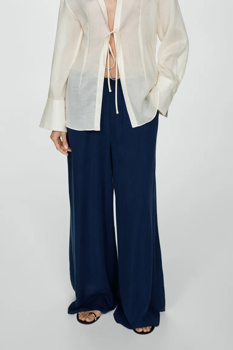 Pantalón lyocell cintura elástica de Mango en Pantalones para argentina