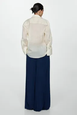 Pantalón lyocell cintura elástica de Mango en Pantalones para argentina