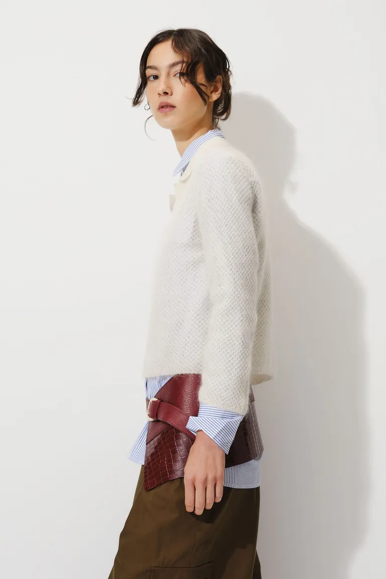 Sweater de punto entreabierto con escote en V y cuello polo de manga larga de Mishka en Buzos y Sweaters para argentina