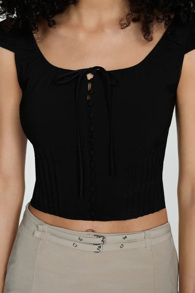Top crop con botones de Mango en Tops para argentina